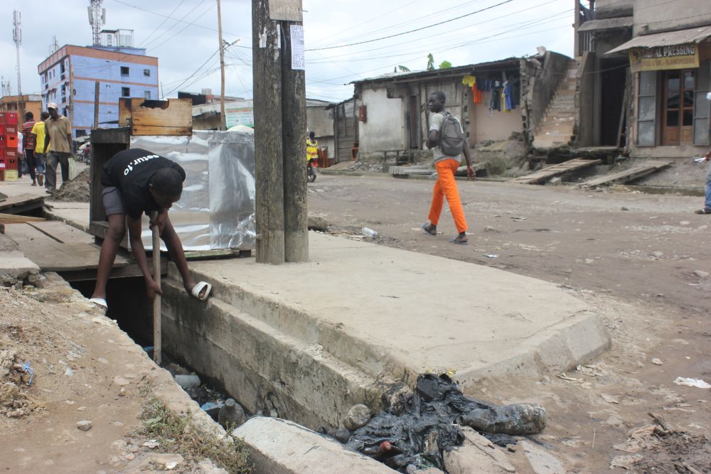 Drainage channels are easily blocked with plastic waste in Douala, Cameroon
